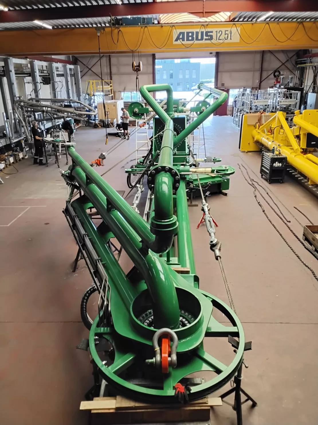 Groene laadarm in werkplaats 2